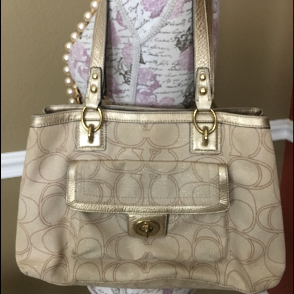 Gold Coach purse.